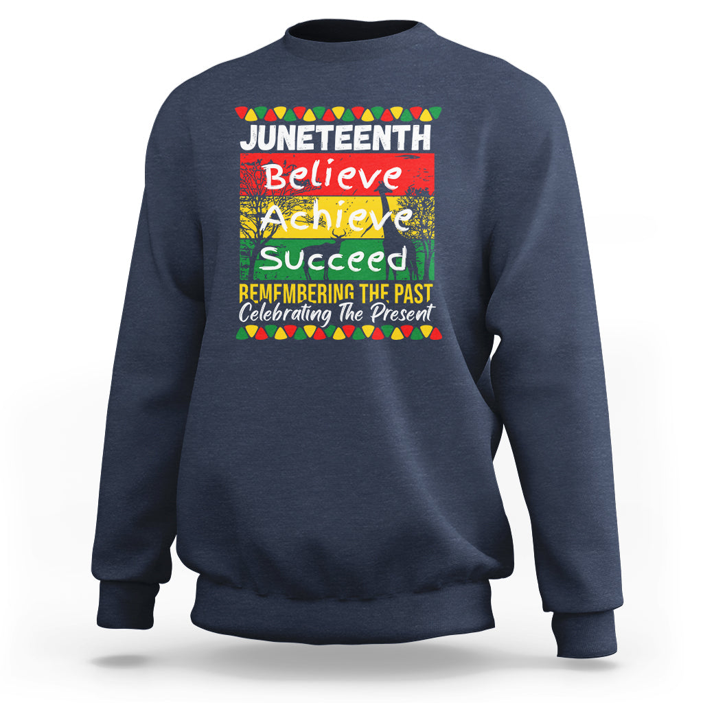 Navy crewneck sweatshirt with colorful Juneteenth Believe Achieve graphic on front