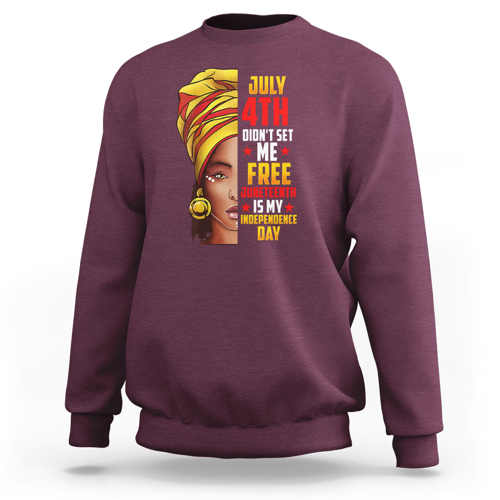 Women’s sweatshirt in maroon with front graphic text and portrait print.