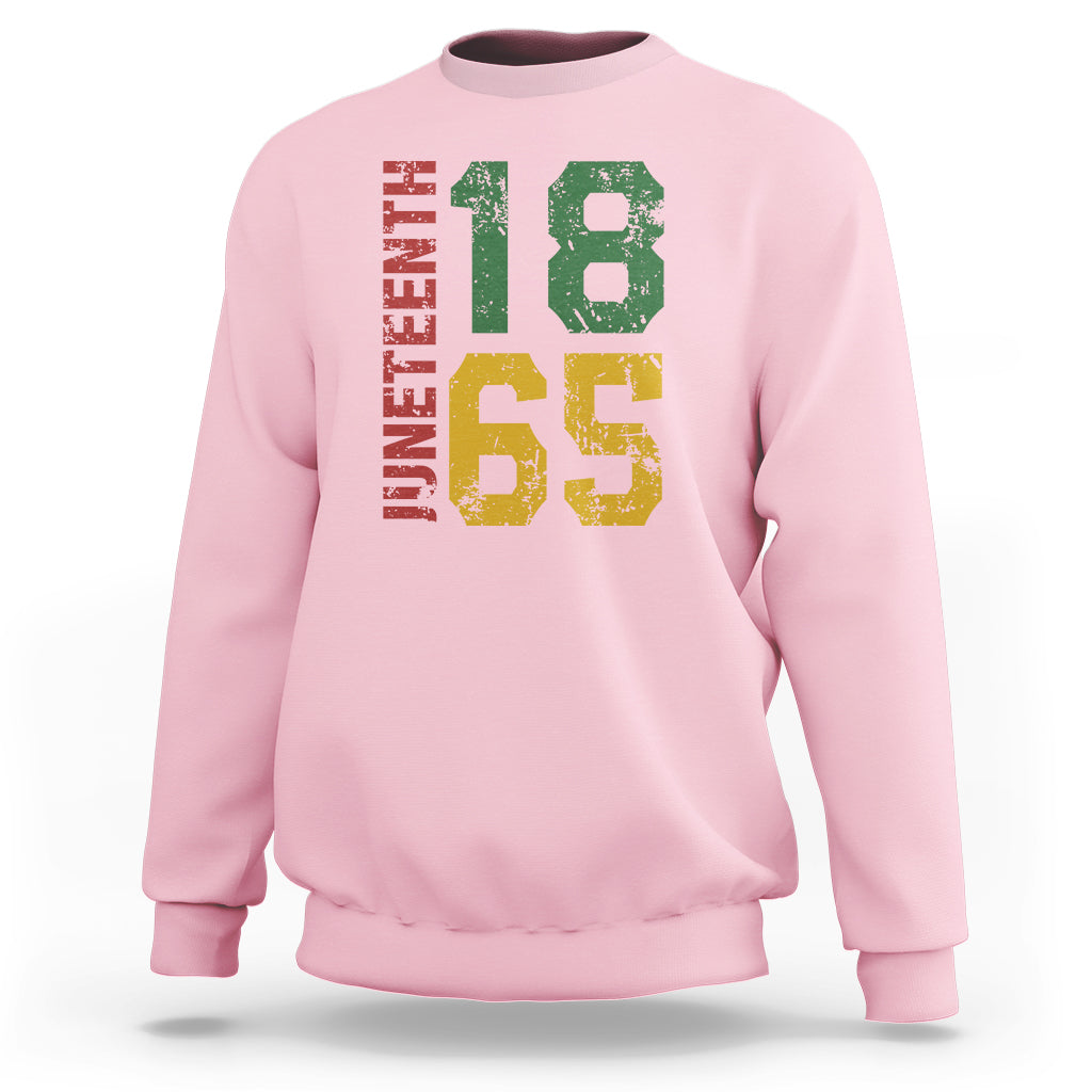 Light pink Juneteenth sweatshirt with multicolor “18” and “65” graphic on front