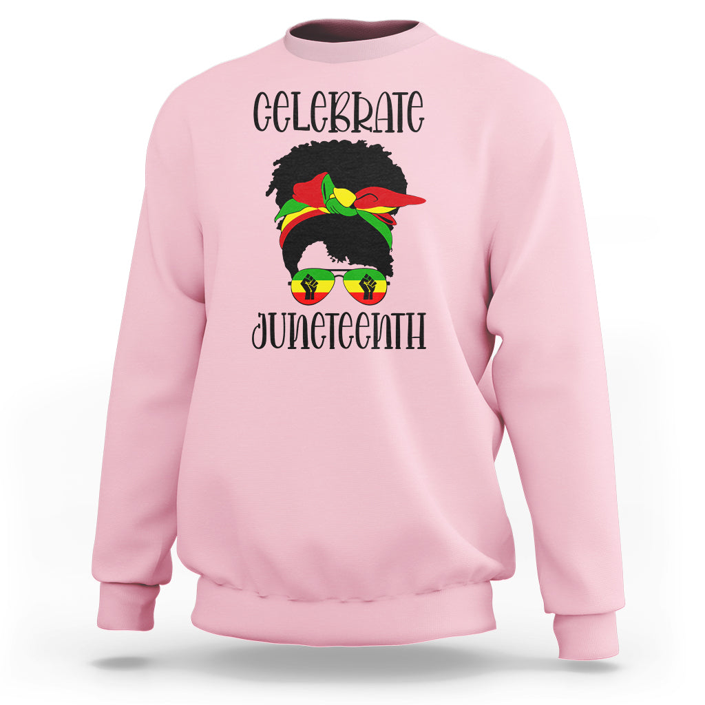 Women's light pink sweatshirt with “Celebrate Juneteenth” front graphic, long sleeves