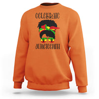 Women's orange sweatshirt with “Celebrate Juneteenth” front graphic, long sleeves