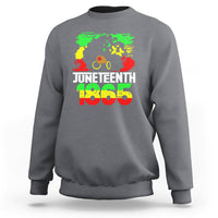 Juneteenth 1865 afro woman graphic sweatshirt, dark heather gray crewneck with ribbed cuffs.