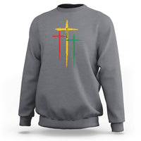 Dark heather gray crewneck sweatshirt with multicolor cross graphic on chest