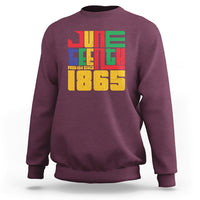 Maroon crewneck sweatshirt with colorful "FREE-ISH SINCE 1865" front graphic