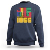 Navy crewneck sweatshirt with colorful "FREE-ISH SINCE 1865" front graphic