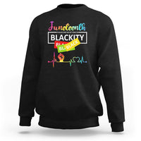 Black crewneck sweatshirt with “Juneteenth Blackity” graphic and colorful heartbeat line