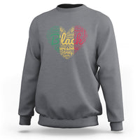 Light gray crewneck sweatshirt with colorful heart graphic on front