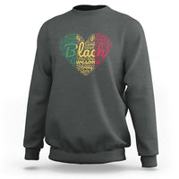 Dark gray crewneck sweatshirt with colorful heart graphic on front