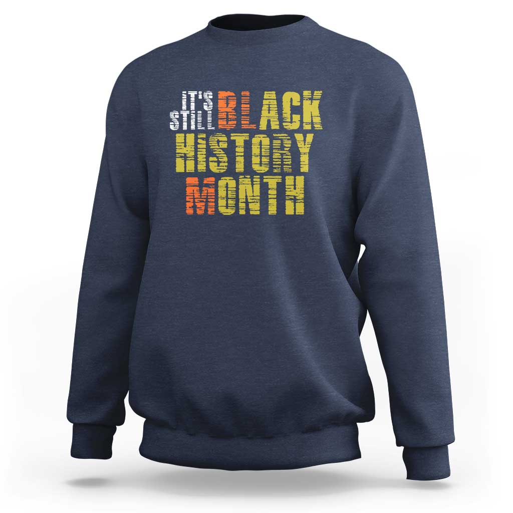 Navy crewneck sweatshirt with “Black History Month” graphic on chest