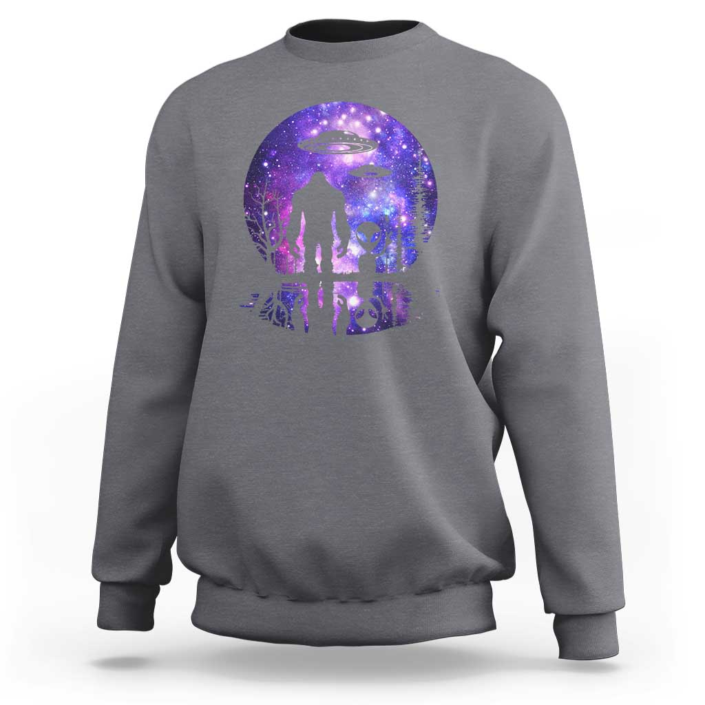 Crewneck sweatshirt in heather gray with galaxy full-moon alien and Bigfoot UFO graphic.