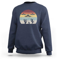 Navy crewneck sweatshirt with vintage UFO and alien graphic on chest