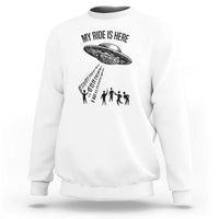 White crewneck sweatshirt with alien UFO graphic and abduction silhouettes