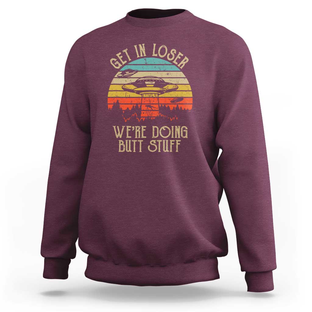 Maroon sweatshirt with retro alien UFO graphic on the front