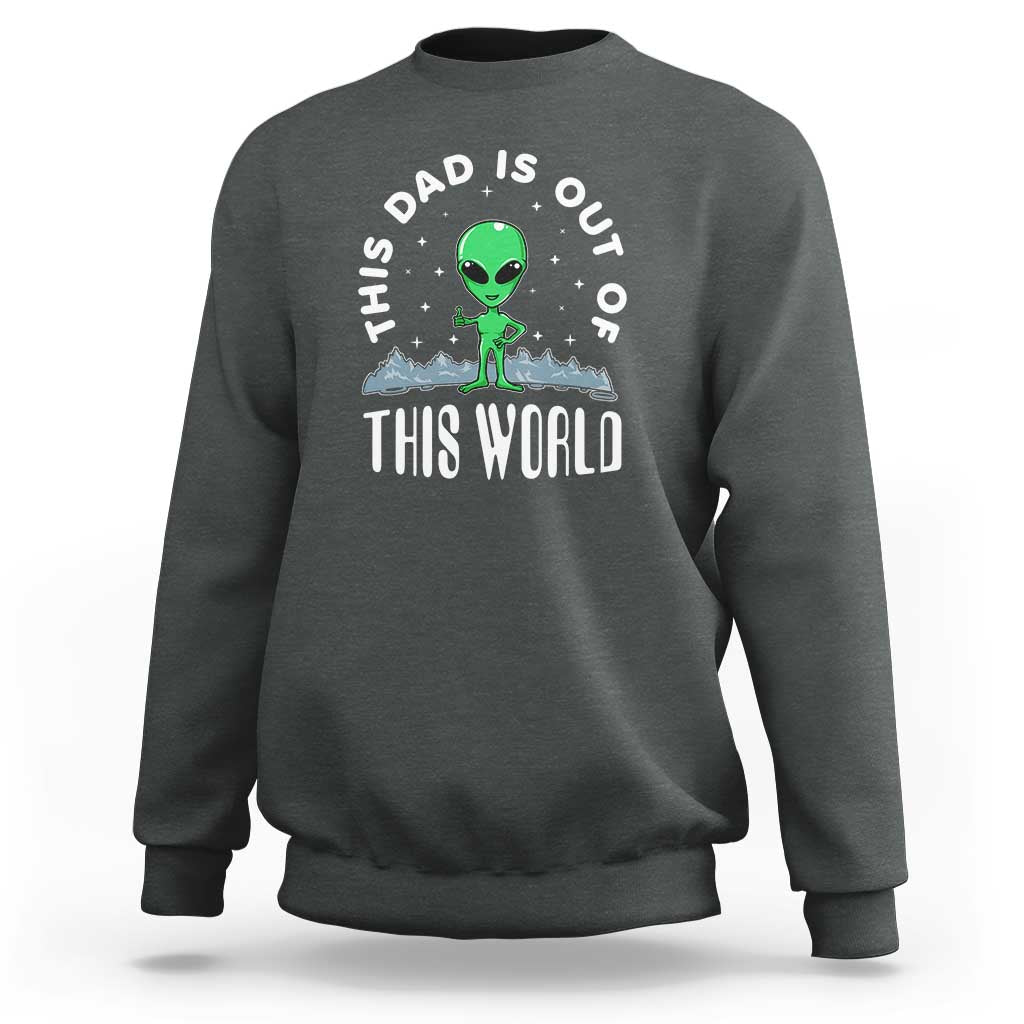 Dark heather gray dad-style sweatshirt with alien graphic and 'THIS WORLD' front print