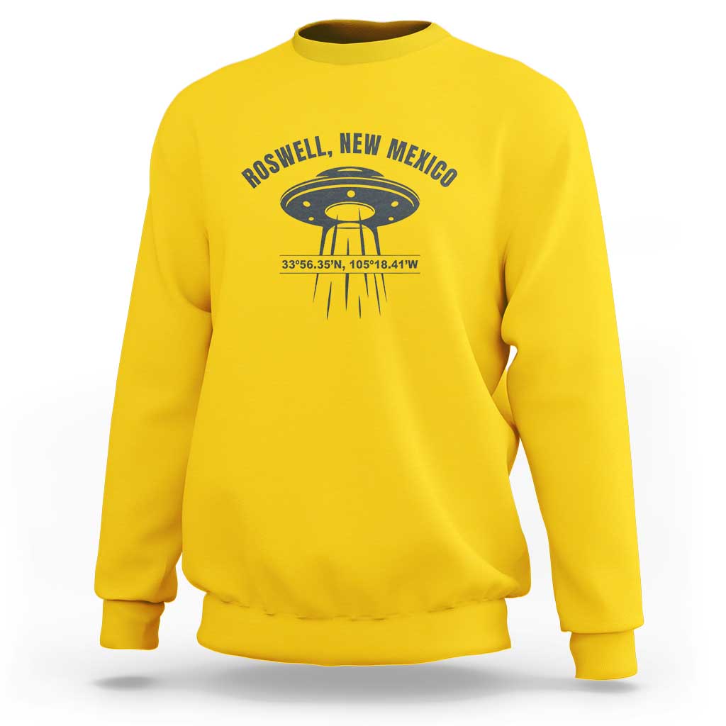 Yellow UFO alien sweatshirt with Roswell, New Mexico text and flying saucer graphic