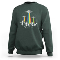 Dark forest green sweatshirt with rainbow UFO graphic and city skyline print on chest