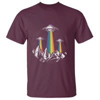 Maroon graphic T-shirt with rainbow UFO lights over mountain silhouette