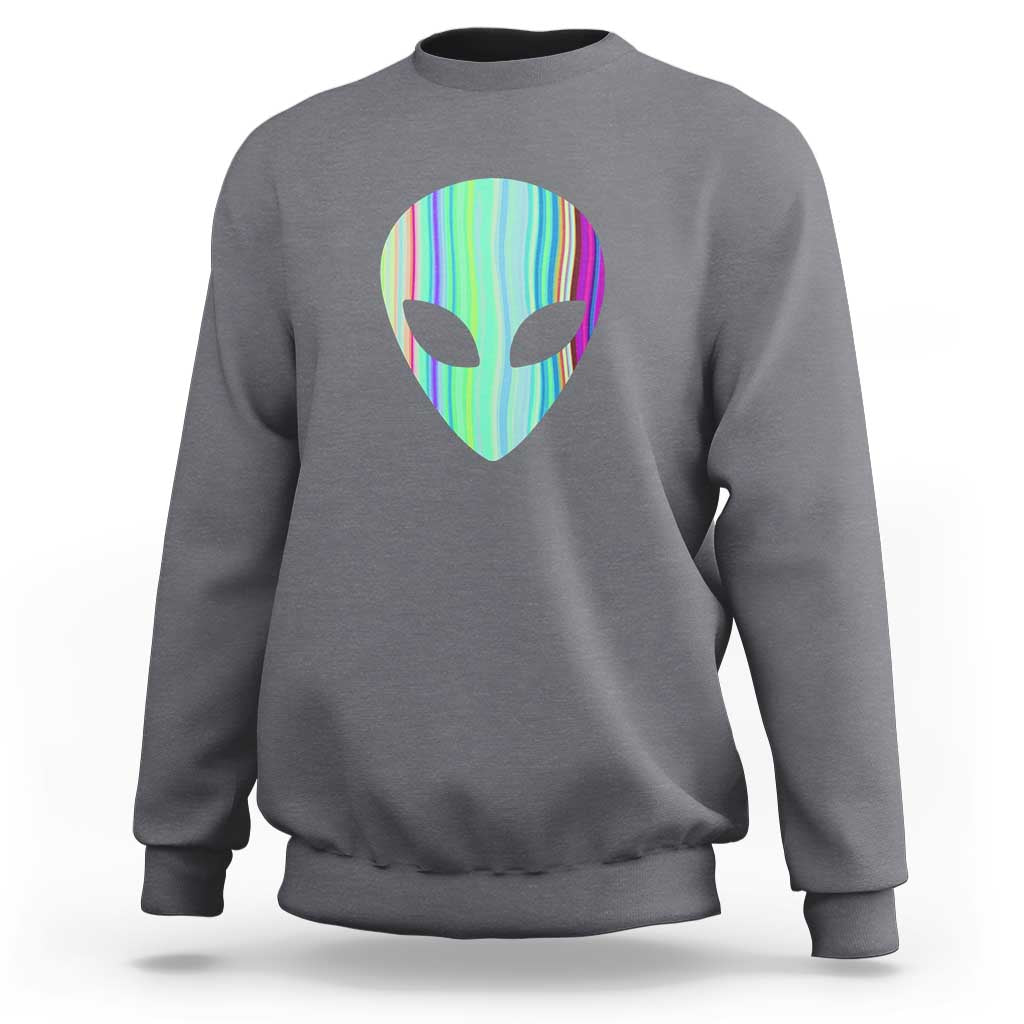 Dark heather gray crewneck sweatshirt with holographic alien head graphic at the chest
