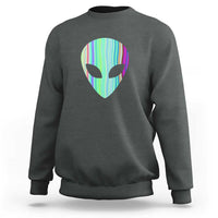 Charcoal gray crewneck sweatshirt with holographic alien head graphic on the chest