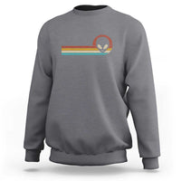 Gray crewneck sweatshirt with colorful alien UFO graphic on chest