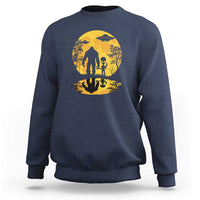 Navy sweatshirt with yellow moon Bigfoot alien UFO silhouette graphic