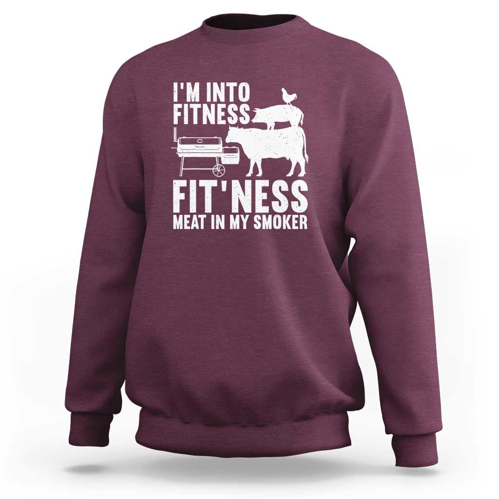 Maroon sweatshirt with front BBQ smoker and cow graphic, crew neck and long sleeves