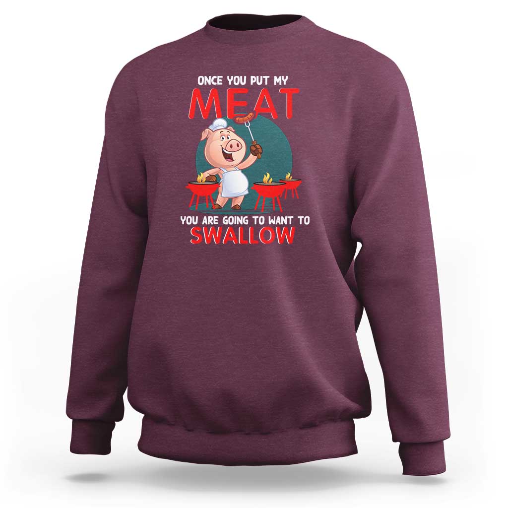 Maroon crewneck sweatshirt with cartoon BBQ pig graphic and bold 'MEAT' text