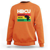 Orange crewneck sweatshirt with HBCU Educated Social Worker front graphic.