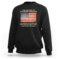 Black crewneck sweatshirt with front graphic featuring a U.S. flag and slogan text