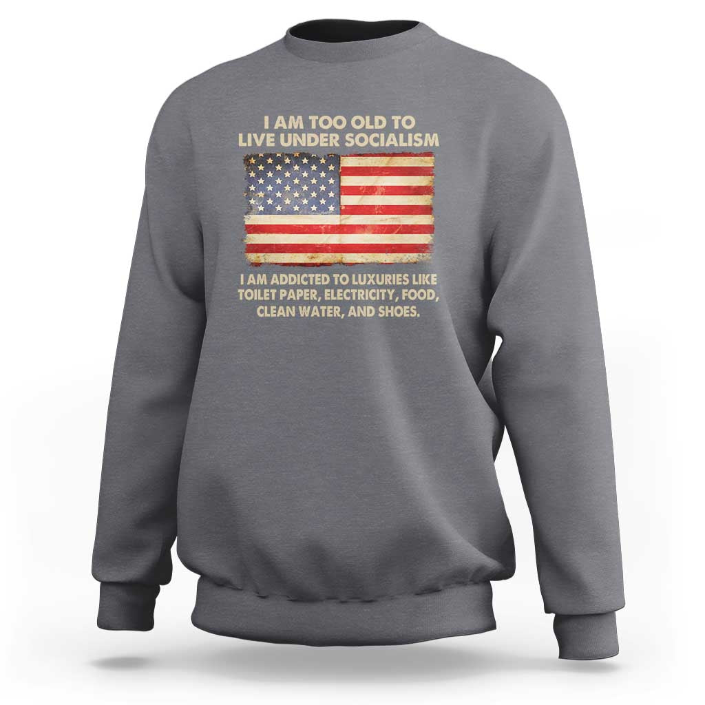 Charcoal crewneck sweatshirt with front graphic featuring a U.S. flag and slogan text