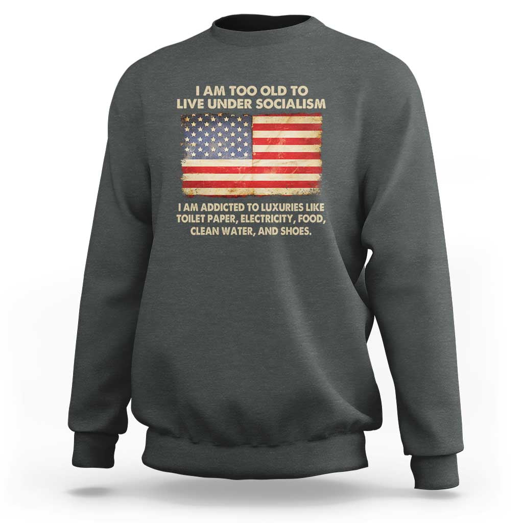 Dark heather crewneck sweatshirt with front graphic featuring a U.S. flag and slogan text