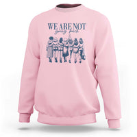 Women's rights sweatshirt, light pink with blue We Are Not front graphic