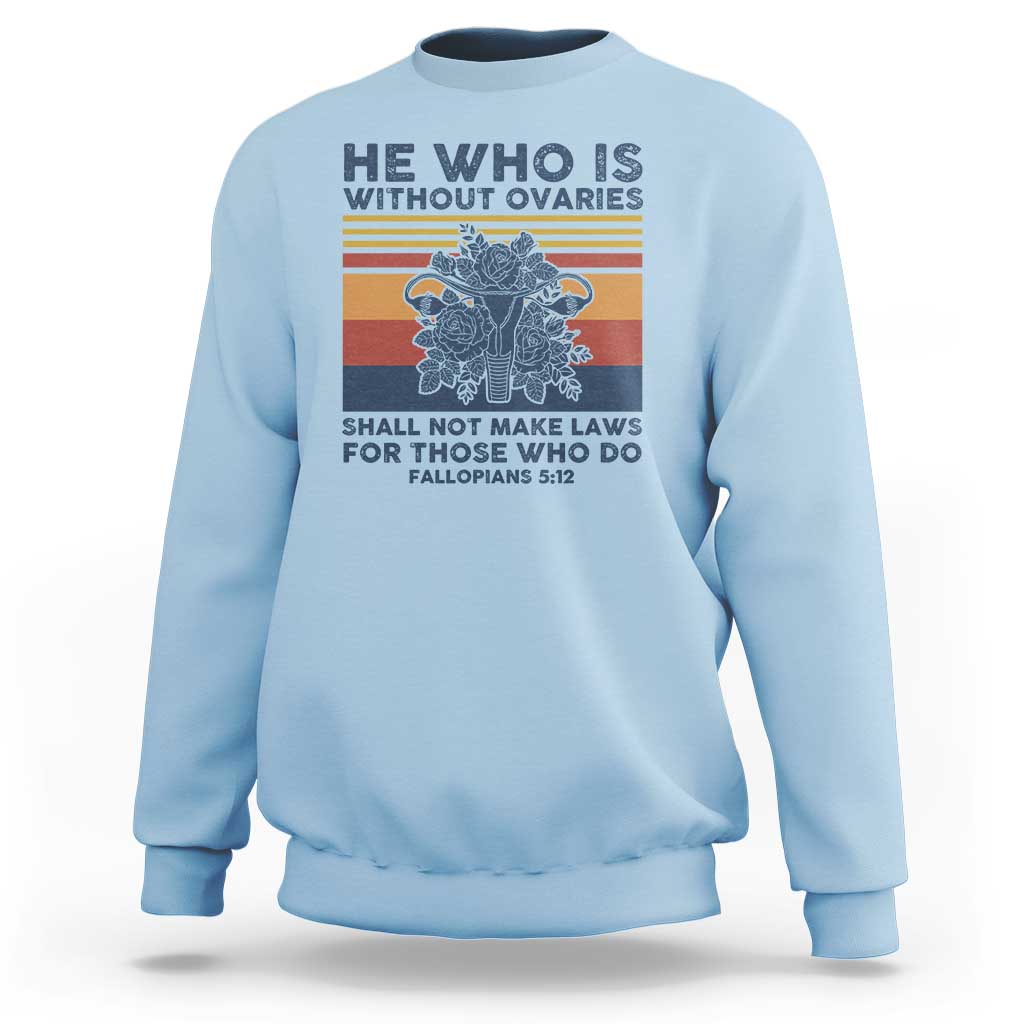 Women’s sweatshirt in light blue with feminist quote graphic print on front, crew neck