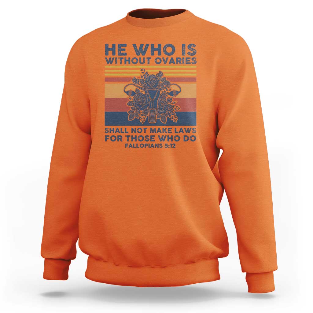 Women’s sweatshirt in orange with feminist quote graphic print on front, crew neck