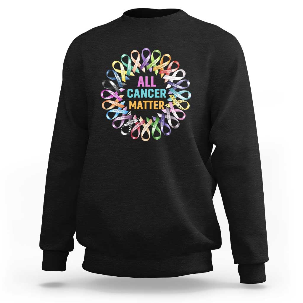 Black sweatshirt with colorful ribbon “ALL CANCER MATTERS” graphic on chest.