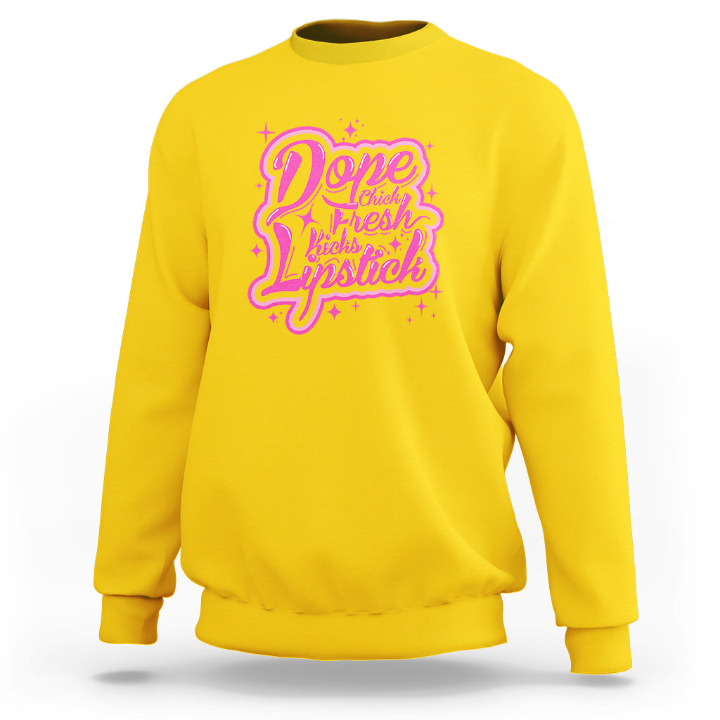 Daisy yellow crewneck sweatshirt with pink “Dope Chick Fresh Lipstick” graphic on chest