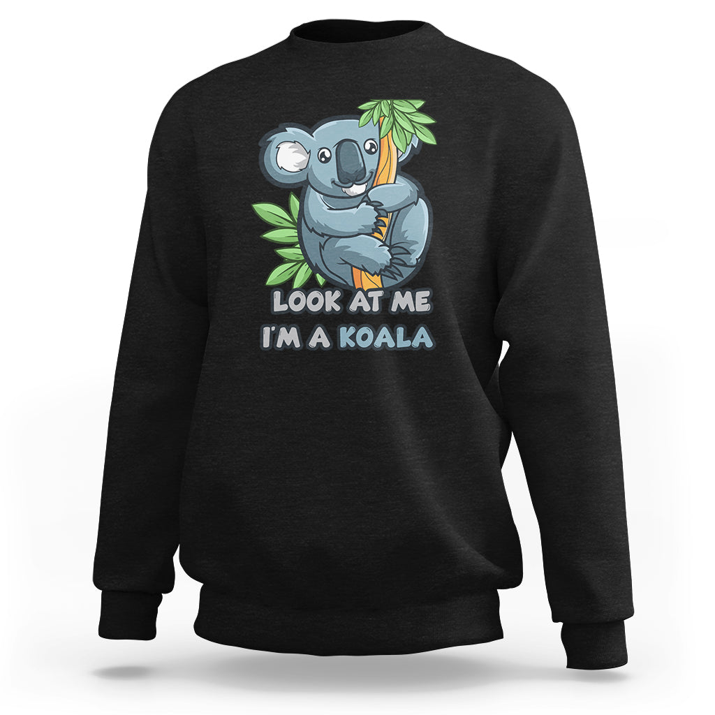 Black koala graphic sweatshirt with “Look at me I’m a koala” front print.