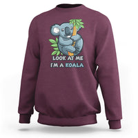 Maroon koala graphic sweatshirt with “Look at me I’m a koala” front print, crew neck.