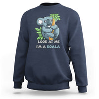 Navy koala graphic sweatshirt with “Look at me I’m a koala” front print, long sleeves.