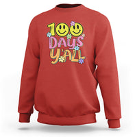 Red sweatshirt with colorful “100 Days Y’all” text and smiling faces graphic