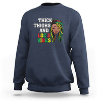 Navy crewneck sweatshirt with 'THICK THIGHS AND LOC'D VIBES' front graphic