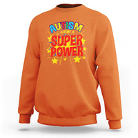Orange autism sweatshirt with 'Autism is my Super Power' graphic on chest