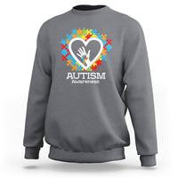 Dark heather gray autism awareness sweatshirt with heart puzzle graphic and 'Autism Awareness' text