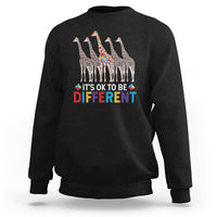 Black crewneck sweatshirt with colorful giraffe graphic and “It’s OK to be Different” text.