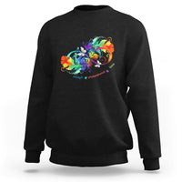 Black autism acceptance sweatshirt with rainbow butterfly feather graphic, crew neck.