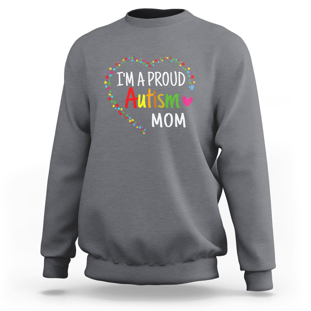 Light gray sweatshirt with "I'm a proud Autism Mom" rainbow arched graphic