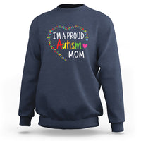 Navy sweatshirt with "I'm a proud Autism Mom" rainbow heart arched graphic