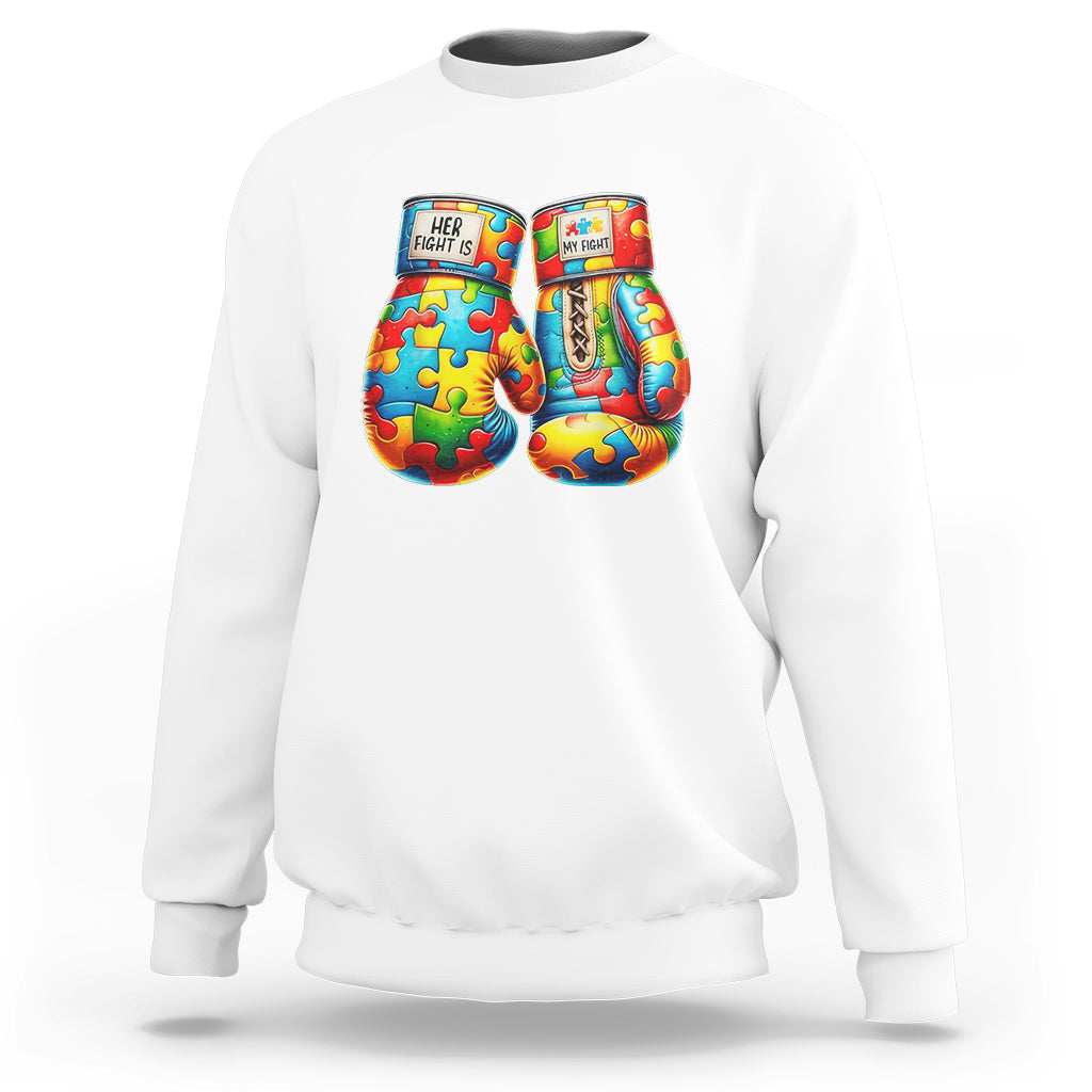 White sweatshirt with colorful boxing glove graphic featuring puzzle-piece artwork