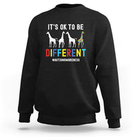 Black autism sweatshirt with “It’s ok to be different” giraffe graphic on front