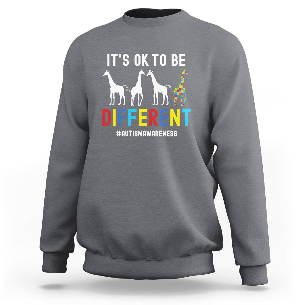 Charcoal autism sweatshirt with “It’s ok to be different” giraffe graphic on front